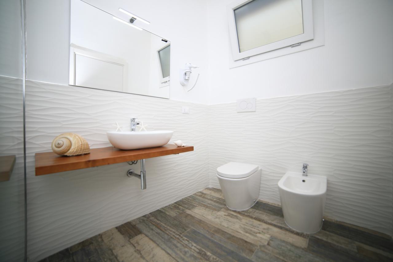 White Aurora Rooms Porto Cesareo Bagian luar foto
